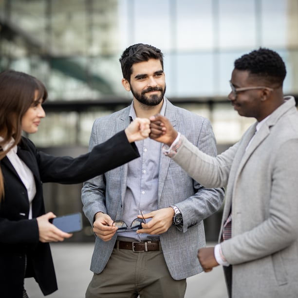 three people in a work partnership